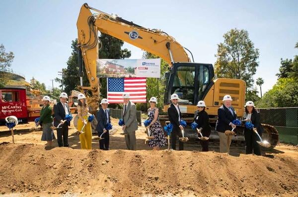 ​Campus leaders take their turn shoveling dirt at the goundbreaking ceremony