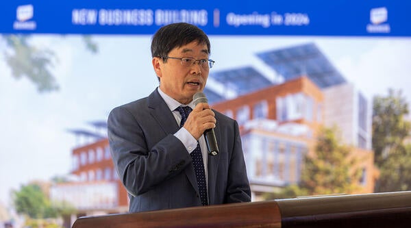 UCR School of Business Dean Yunzeng Wang giving remarks at the groundbreaking ceremony