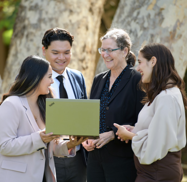 Professor of Finance Jean Helwege with students