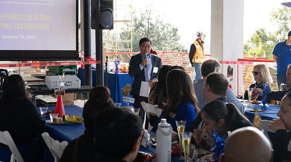 Dean at New Building Capping Ceremony