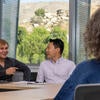 Professors Meeting in the New Business Building Conference Room